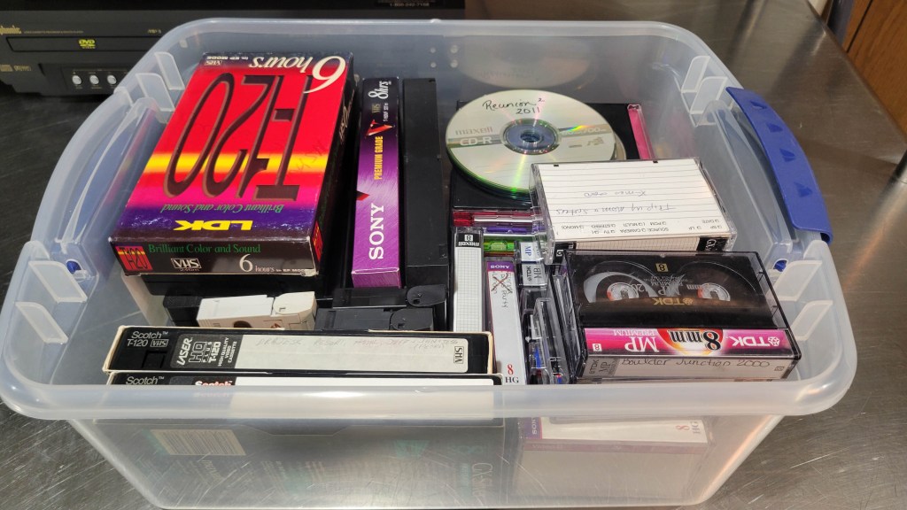 5-steps-before-VHS-conversion, bins of outdated media, preserve old memories, family history, arranged memories, photo management, photo organizing
